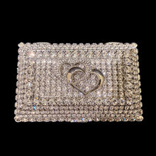 Load image into Gallery viewer, Glittering keepsake box covered in swarovski crystals. Two interlocking hearts on the top of the box.
