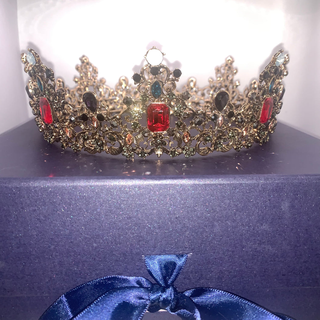 Regal Kings crown filled with faux rubies and coloured stones